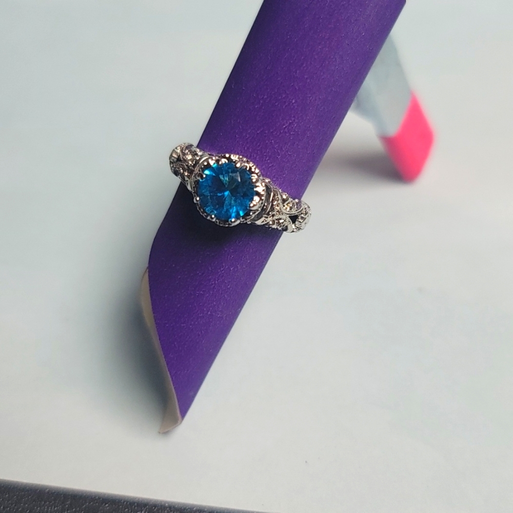 1.10ctw Swiss Blue Topaz & White Topaz Ring 